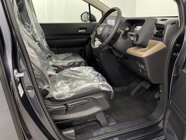 ホンダ フリード ハイブリット e:HEV AIR EX 埼玉県 2025(令7)年 0.1千km メテオロイドグレーメタリック 登録済未使用車/純正メモリナビ/Bluetooth/フルセグ/バックカメラ/両側パワースライドドア/ホンダセンシング/・レーダークルーズコントロール/・レーンキープアシスト/・衝突軽減システム/・誤発進抑制機能/・標識認識機能/前席シートヒーター/ハーフレザーシート/純正１５インチアルミホイール/プッシュスタート/スマートキー/スペアキー