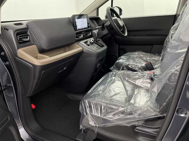 ホンダ フリード ハイブリット e:HEV AIR EX 埼玉県 2025(令7)年 0.1千km メテオロイドグレーメタリック 登録済未使用車/純正メモリナビ/Bluetooth/フルセグ/バックカメラ/両側パワースライドドア/ホンダセンシング/・レーダークルーズコントロール/・レーンキープアシスト/・衝突軽減システム/・誤発進抑制機能/・標識認識機能/前席シートヒーター/ハーフレザーシート/純正１５インチアルミホイール/プッシュスタート/スマートキー/スペアキー