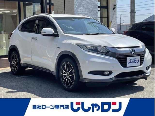 ホンダ ヴェゼル ハイブリッド X 高知県 2014(平26)年 10万km ホワイトオーキッドパール (株)IDOMが運営する【じしゃロン高知店】の自社ローン専用車両になります。こちらは現金またはオートローンご利用時の価格です。自社ローンご希望の方は別途その旨お申付け下さい
