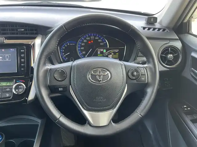 トヨタ カローラ フィールダー ハイブリッドG 愛知県 2015(平27)年 2.2万km ホワイトパールクリスタルシャイン /当店買取/1オーナー/禁煙//純正SDナビ//フルセグTV/CD/DVD/SD/Bluetooth//バックカメラ//PCS/LDA/AHB/Pソナー//ビルトインETC//カーテンエアバック//TRC/純正Fマット/ドアバイザー/革巻きステア//保証書/取説/ナビ取説/スペアキー