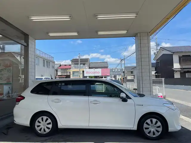 トヨタ カローラ フィールダー ハイブリッドG 愛知県 2015(平27)年 2.2万km ホワイトパールクリスタルシャイン /当店買取/1オーナー/禁煙//純正SDナビ//フルセグTV/CD/DVD/SD/Bluetooth//バックカメラ//PCS/LDA/AHB/Pソナー//ビルトインETC//カーテンエアバック//TRC/純正Fマット/ドアバイザー/革巻きステア//保証書/取説/ナビ取説/スペアキー