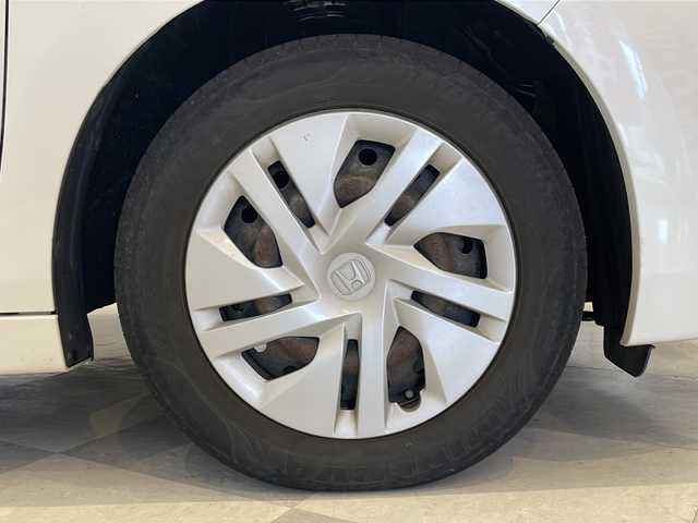 ホンダ ステップワゴン G 福井県 2016(平28)年 8万km ホワイトオーキッドパール 純正9インチナビ/フルセグTV/バックカメラ/フリップダウンモニター/クルーズコントロール/ETC/前後ドライブレコーダー/両側パワースライドドア/オートライト/HIDヘッドライト/社外AW付スタッドレスタイヤ車載/プッシュスタート/スマートキー×2/ステアリングスイッチ/純正フロアマット