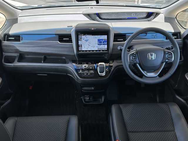 ホンダ フリード ハイブリット G ホンダセンシング 静岡県 2020(令2)年 5.5万km プラチナホワイトパール 【安全装備】/ホンダセンシング/アダプティブ・クルーズ・コントロール（ACC）/・作動車速域：約30km/hから100km/h間/車線維持支援システム（LKAS）/・作動車速：約65km/hから100km/h間/・ステアリング制御/衝突軽減ブレーキ（CMBS）/・歩行者検知機能/・作動車速：約80km/h未満時/・対向車車速：約30km/hから80km/h時/誤発進抑制機能（前進）/・ミリ波レーダー検知：作動車速10km/h未満/歩行者事故低減ステアリング/・作動車速10km/hから40km/h間/路外逸脱抑制機能/・作動車速：約60km/hから100km/h間/先行車発進お知らせ機能/標識認識機能/【主要装備】/９インチプレミアムインターナビ　/バックカメラ　/スマートキー　/ＥＴＣ　/ハーフレザーシート　/シートヒーター　/両側パワースライドドア　/純正１５インチアルミホイール　/ＬＥＤアクティブコーナリングライト