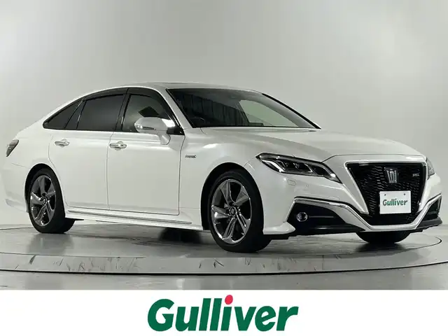 トヨタ クラウン ハイブリッド RS アドバンス 佐賀県 2019(平31)年 1.5万km ホワイトパールクリスタルシャイン 純正8インチナビ/フルセグTV/CD/DVD/Bluetooth/サンルーフ/衝突被害軽減システム/ブラインドスポットモニター/パーキングサポートブレーキ/レーダークルーズコントロール/レーンアシスト/ヘッドアップディスプレイ/ロードサインアシスト/オートライト/オートマチックハイビーム/LEDヘッドライト/LEDフォグライト/電子パーキング/ブレーキホールド/パドルシフト/ビルトインETC/ステアリングヒーター/運転席・助手席シートヒーター/運転席・助手席パワーシート/メモリーシート/ハーフレザーシート/純正18インチアルミホイール/純正フロアマット/スマートキー