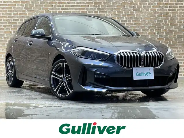 ＢＭＷ １１８ｄ Mスポーツ EDジョイ+ 岩手県 2020(令2)年 3.7万km ミネラルグレー ディーゼルターボ/8速AT/衝突回避・被害軽減ブレーキ/レーンアシスト/パーキングアシスト/コーナーセンサー/ダイナミックスタビリティアシスト/ダイナミックトラクションコントロール/可変スピードリミッター/クロストラフィックウォーニング/ワイヤレスチャージング/運転席メモリ機能付きパワーシート/10.25インチナビ/バックカメラ/ドライブレコーダー/ETC/LEDヘッドライト/フロント・リヤフォグランプ/純正18インチアルミホイール