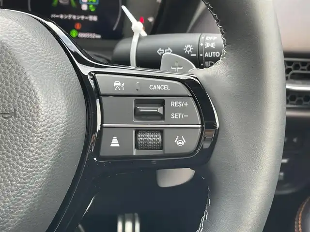 ホンダ ＺＲ－Ｖ ハイブリッド e:HEV Z 東京都 2025(令7)年 0.1万km 黒 純正９型ナビ/・AM/FM/フルセグ/BOSEプレミアムサウンドシステム/全周囲カメラ/前席シートヒーター/運転席メモリパワーシート/・前席パワーシート/ブラインドスポットモニター/前後ドライブレコーダー/おくだけ充電/ステアリングヒーター/LEDヘッドランプ/ホンダセンシング/（予防運転支援システム）/・衝突軽減ブレーキ/・後方誤発進抑制機能/・歩行者事故低減ステアリング/・追従機能付きクルーズコントロール/・車線維持支援システム/・標識認識機能/・後退時出庫サポート/・パーキングセンサーシステム/プッシュエンジンスタート/純正フロアマット/スマートキー