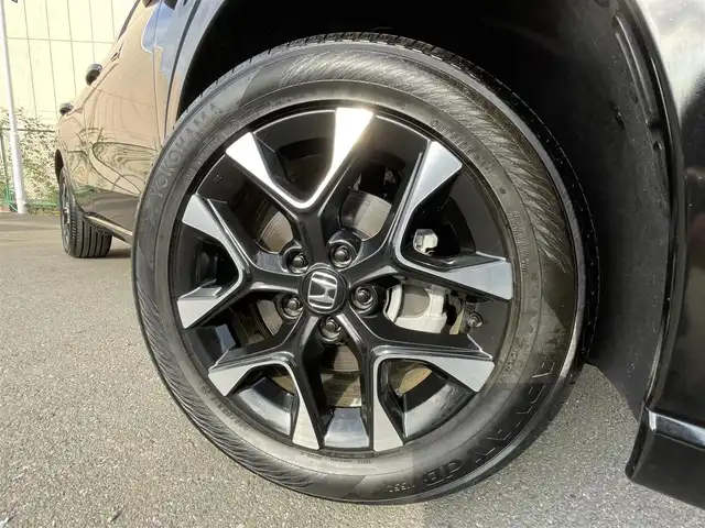 ホンダ ＺＲ－Ｖ ハイブリッド e:HEV Z 東京都 2025(令7)年 0.1万km 黒 純正９型ナビ/・AM/FM/フルセグ/BOSEプレミアムサウンドシステム/全周囲カメラ/前席シートヒーター/運転席メモリパワーシート/・前席パワーシート/ブラインドスポットモニター/前後ドライブレコーダー/おくだけ充電/ステアリングヒーター/LEDヘッドランプ/ホンダセンシング/（予防運転支援システム）/・衝突軽減ブレーキ/・後方誤発進抑制機能/・歩行者事故低減ステアリング/・追従機能付きクルーズコントロール/・車線維持支援システム/・標識認識機能/・後退時出庫サポート/・パーキングセンサーシステム/プッシュエンジンスタート/純正フロアマット/スマートキー