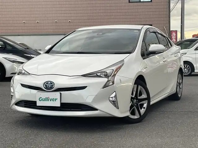 トヨタ プリウス S ツーリングセレクション 群馬県 2016(平28)年 5万km ホワイトパールクリスタルシャイン 純正SDナビ、地デジ、Bluetooth、CD、DVD/　（DSZT-YC4T）/バックカメラ/プリクラッシュセーフティ/レーダークルーズコントロール/革巻きステア/LEDヘッドライト/ビルトインETC/スマートキー×１/合皮シート/前席シートヒーター/ウインカーミラー/ドアバイザー/純正ドライブレコーダー（前方録画）/TVキャンセラー/オートマチックハイビーム/W・サイド・カーテンエアバッグ/整備手帳、取説