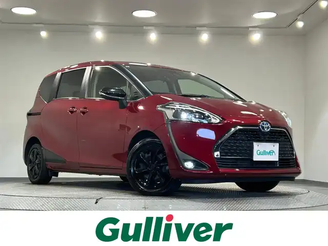 トヨタ シエンタ ハイブリッド G セーフティエディションⅡ 愛知県 2021(令3)年 4.3万km センシュアルレッドマイカ 純正９インチナビ　/(Bluetooth/フルセグTV/SD/FM/SM/CD・DVD再生）/純正１２インチフリップダウンモニター　/トヨタセーフティセンス/　　-プリクラッシュセーフティ/　　-レーンディパーチャーアラート/　　-オートマチックハイビーム　/両側パワースライドドア　/シートヒーター　/ビルトインＥＴＣ　/バックカメラ　/ステアリングヒーター　/クルーズコントロール　/ＬＥＤヘッドライト/LEDフォグランプ/USB接続/純正フロアマット