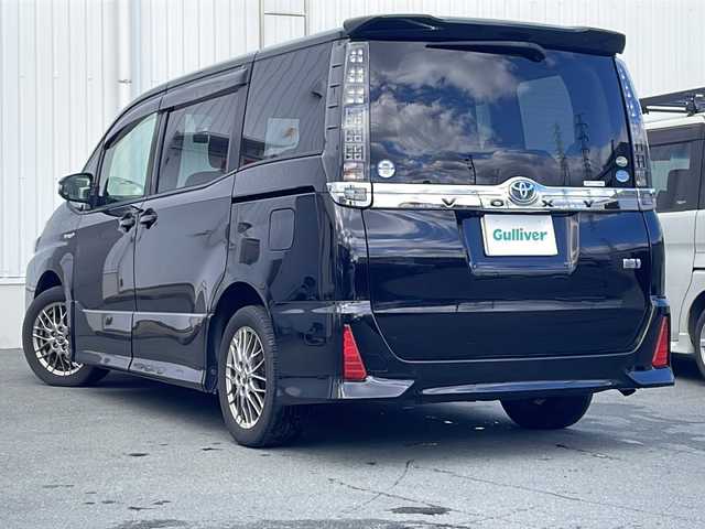 トヨタ ヴォクシー ハイブリッド ZS 三重県 2016(平28)年 13.5万km ブラック ALPINE10型ナビ/ALPINE12.8型フリップダウンモニター/バックカメラ/フルセグTV/前後ドラレコ/ETC/HDMI/USB入力/ステアリングスイッチ/レーンキープアシスト/衝突被害軽減システム/LEDヘッドライト/オートハイビーム/リアサンシェード/オートリトラミラー