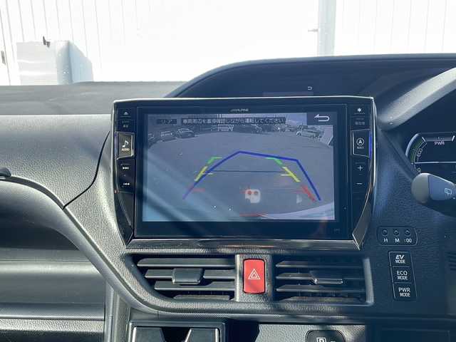 トヨタ ヴォクシー ハイブリッド ZS 三重県 2016(平28)年 13.5万km ブラック ALPINE10型ナビ/ALPINE12.8型フリップダウンモニター/バックカメラ/フルセグTV/前後ドラレコ/ETC/HDMI/USB入力/ステアリングスイッチ/レーンキープアシスト/衝突被害軽減システム/LEDヘッドライト/オートハイビーム/リアサンシェード/オートリトラミラー