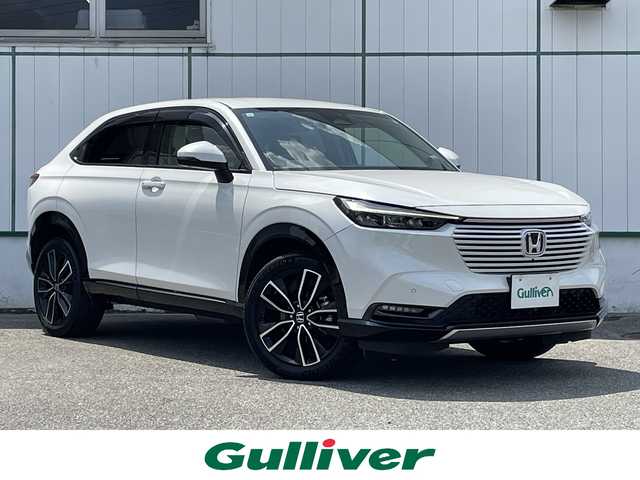 ホンダ ヴェゼル ハイブリッド e:HEV Z 山梨県 2021(令3)年 4.8万km プラチナホワイトパール 純正メモリナビ/純正フルセグTV/Bluetooth接続/アラウンドビューモニター/バックモニター/ETC2.0/シートヒーター/純正１８インチアルミホイール/電動リアゲート/コーナーセンサー/前後ドライブレコーダー/エアバックW＋サイド/カーテンエアバッグ/スペアキー　１本/取扱説明書/保証書