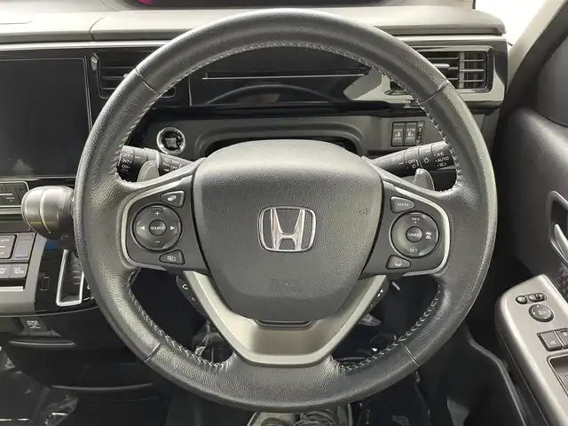 ホンダ ステップワゴン スパーダ ホンダセンシング 埼玉県 2019(令1)年 5.5万km プレミアムスパークルブラックパール ホンダセンシング　純正１０インチナビ　フルセグＴＶ　Ｂｌｕｅｔｏｏｔｈ　バックカメラ　純正１１．６インチフリップダウンモニター　両側パワースライドドア　レーダークルーズコントロール　ＥＴＣ　ドラレコ