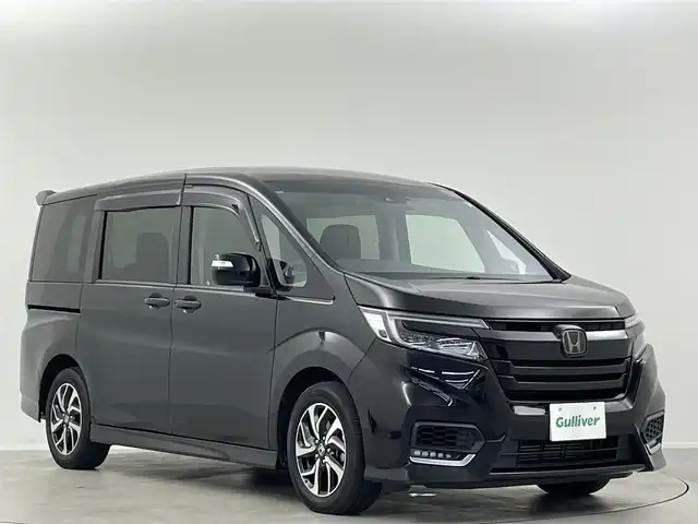 ホンダ ステップワゴン スパーダ ホンダセンシング 埼玉県 2019(令1)年 5.5万km プレミアムスパークルブラックパール ホンダセンシング　純正１０インチナビ　フルセグＴＶ　Ｂｌｕｅｔｏｏｔｈ　バックカメラ　純正１１．６インチフリップダウンモニター　両側パワースライドドア　レーダークルーズコントロール　ＥＴＣ　ドラレコ