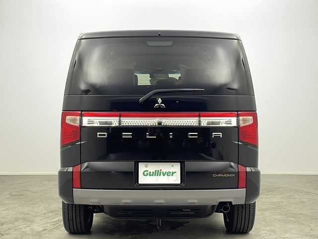 三菱 デリカＤ：５ シャモニー 大阪府 2025(令7)年 0.1千km 黒 登録済み未使用車/バックカメラ(全方位)/100V電源/クルーズコントロール(追従走行あり)/ブラインドスポットモニター/パドルシフト/オートライト/オートマチックハイビーム/衝突軽減システム/横滑り防止システム/ステアリングヒーター/パワーシート(運転席)/パワーバックドア/両側パワースライドドア/スマートキー/純正18インチAW/保証書/取扱説明書