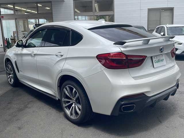 ＢＭＷ Ｘ６ xDrive35i Mスポーツ 京都府 2016(平28)年 5.7万km 白 純正ＨＤＤナビ/(CD/DVD/フルセグTV/Bluetooth接続)/サンルーフ/４ＷＤ/本革シート/全方位カメラ/全席シートヒーター/パワーシート/エアシート/電動リアゲート/純正アルミホイール２０インチ/クルコン（追従有）