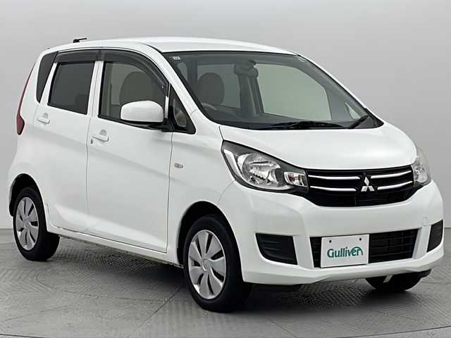 三菱 ｅＫワゴン E 新潟県 2015(平27)年 4.5万km ホワイト 社外メモリナビ/　　CD/DVD/AM/FM/BT/SD/フルセグ/運転席シートヒーター/社外アルミホイール付スタッドレスタイヤ車載(5ミリ)/電動格納ミラー/ヘッドライトレベライザー/フロアマット/リモコンキー