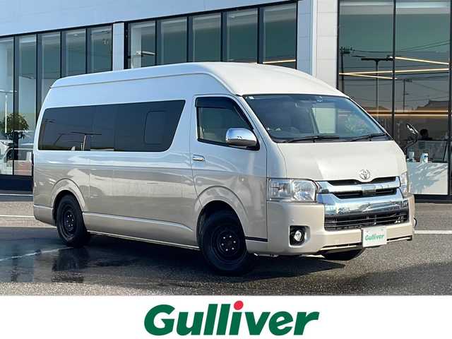 トヨタ ハイエース グランドキャビン 新潟県 2019(令1)年 10.5万km ベージュメタリック/ホワイトパールクリスタルシャイン 4WD/社外SDナビ/(BT/AM/FM/CD/DVD)/片側パワースライドドア/ドライブレコーダー/横滑り防止装置/衝突軽減装置/レーンキープアシスト/コーナーセンサー/電動格納ミラー/オートライト/オートハイビーム/純正フロアマット/ETC/純正テールライト積載
