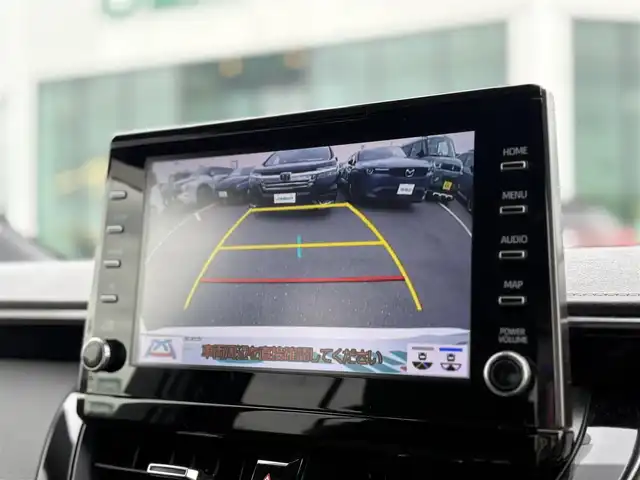 トヨタ カローラツーリング ハイブリッド ダブルバイビー 東京都 2019(令1)年 5.8万km ホワイトパールクリスタルシャイン TOYOTA純正ナビ付9インチディスプレイオーディオ/・フルセグTV/・Bluetooth接続/・T-Connect/・Apple Car Play/・Android Auto/Toyota Safety Sense/・レーントレーシングアシスト/・プリクラッシュセーフティ/・ブラインドスポットモニター/・リヤクロストラフィックアラート/・パーキングサポートブレーキ/・ロードサインアシスト/・レーダークルーズコントロール/・先行車発進告知/ヘッドアップディスプレイ/電子パーキング/オートホールド/プッシュスタート/ドライブレコーダー（DRT-H68A）/バックカメラ/ETC2.0/純正フロアマット/純正17インチアルミホイール/ハーフレザーシート/シートヒーター/ステアリングヒーター/LEDヘッドライト