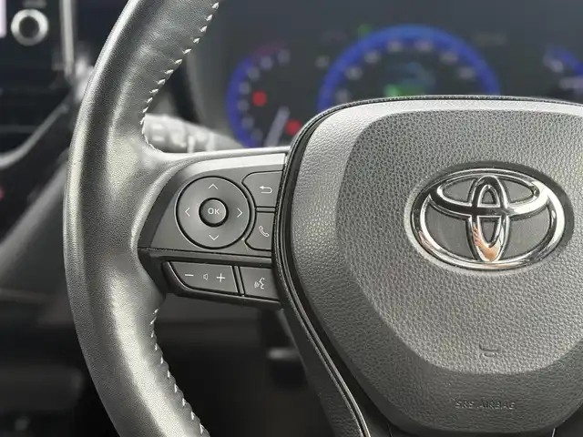 トヨタ カローラツーリング ハイブリッド ダブルバイビー 東京都 2019(令1)年 5.8万km ホワイトパールクリスタルシャイン TOYOTA純正ナビ付9インチディスプレイオーディオ/・フルセグTV/・Bluetooth接続/・T-Connect/・Apple Car Play/・Android Auto/Toyota Safety Sense/・レーントレーシングアシスト/・プリクラッシュセーフティ/・ブラインドスポットモニター/・リヤクロストラフィックアラート/・パーキングサポートブレーキ/・ロードサインアシスト/・レーダークルーズコントロール/・先行車発進告知/ヘッドアップディスプレイ/電子パーキング/オートホールド/プッシュスタート/ドライブレコーダー（DRT-H68A）/バックカメラ/ETC2.0/純正フロアマット/純正17インチアルミホイール/ハーフレザーシート/シートヒーター/ステアリングヒーター/LEDヘッドライト