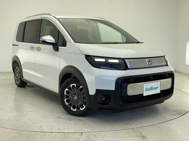 ホンダ フリード ハイブリット e:HEV クロスター 千葉県 2025(令7)年 0.1千km プラチナホワイトパール 登録済未使用車/純正SDナビ/フルセグTV/Bluetooth/USB/バックカメラ/ブラインドスポットモニター/クリアランスソナー/両側パワースライドドア/ハーフレザーシート/シートヒーター/ISOFIX/Apple Carplay/Android Auto/ホンダセンシング/追従クルーズコントロール/レーンキープアシスト/衝突被害軽減ブレーキ/オートマチックハイビーム/LEDヘッドライト