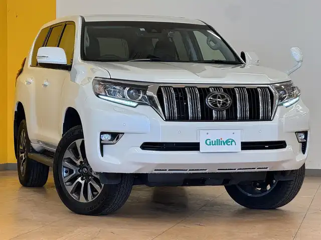 トヨタ ランドクルーザー プラド TX Lパッケージ 群馬県 2022(令4)年 0.9万km ホワイトパールクリスタルシャイン セーフティセンス/サンルーフ/純正9インチSDナビ/　　CD/DVD/BT/フルセグ/MSV/バックカメラ/レーダークルーズコントロール/LEDオートライト/オートハイビーム/レザーシート/前席シートヒーター/前席シートベンチレーション/前席パワーシート/純正19インチAW/コーナーセンサー/ステアリングスイッチ/横滑り防止装置/サイド・カーテンエアバッグ/スマートキー/ビルトインETC