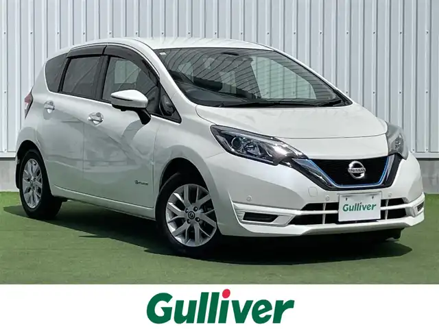 日産 ノート e－パワー X 香川県 2019(令1)年 4.9万km ブリリアントホワイトパール 登録時走行距離 48891km/純正ナビ/→AM/FM/フルセグTV/Bluetooth/アラウンドビューモニター/ドライブレコーダー/デジタルインナーミラー/ETC/オートライト/純正１５インチAW/エマージェンシーブレーキアシスト/コーナーセンサー/レーンキープアシスト/プッシュスタート/スマートキー