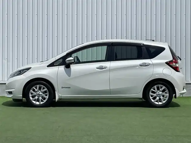 日産 ノート e－パワー X 香川県 2019(令1)年 4.9万km ブリリアントホワイトパール 登録時走行距離 48891km/純正ナビ/→AM/FM/フルセグTV/Bluetooth/アラウンドビューモニター/ドライブレコーダー/デジタルインナーミラー/ETC/オートライト/純正１５インチAW/エマージェンシーブレーキアシスト/コーナーセンサー/レーンキープアシスト/プッシュスタート/スマートキー