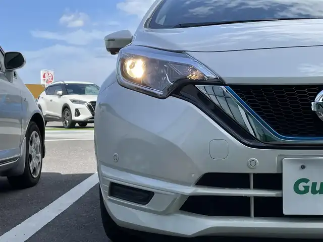 日産 ノート e－パワー X 香川県 2019(令1)年 4.9万km ブリリアントホワイトパール 登録時走行距離 48891km/純正ナビ/→AM/FM/フルセグTV/Bluetooth/アラウンドビューモニター/ドライブレコーダー/デジタルインナーミラー/ETC/オートライト/純正１５インチAW/エマージェンシーブレーキアシスト/コーナーセンサー/レーンキープアシスト/プッシュスタート/スマートキー