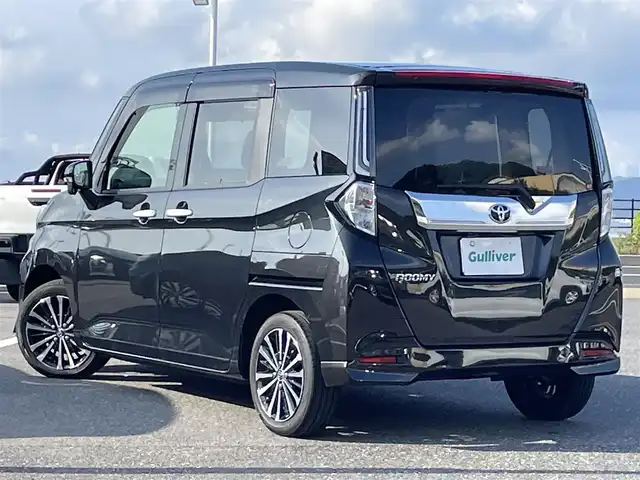 トヨタ ルーミー カスタムG－T 島根県 2022(令4)年 4.3万km ブラックマイカメタリック 登録時走行距離42676ｋｍ/純正ナビ（Bluetooth・AM・FM・CD・DVD・フルセグTV）/後席モニター/全方位カメラ(フロント・サイド・バック)/両側パワースライドドア/シートヒーター（運転席・助手席）/置くだけ充電機能/純正ドライブレコーダー/純正AW/純正フロアマット/純正サンシェード(後席)/ブレーキホールド/レーダークルーズコントロール/コーナーセンサー/レーンキープアシスト/衝突被害軽減ブレーキ/横滑り防止装置/ETC/LEDヘッドライト(オート)/フォグランプ/アイドリングストップ/ウィンカーミラー/ドアバイザー/プッシュスタート/シートバックテーブル/禁煙車/冬タイヤあり