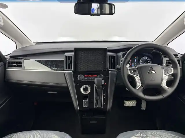 三菱 デリカＤ：５ シャモニー 愛知県 2025(令7)年 0.1千km 黒Ⅱ 登録済未使用車/両側パワースライドドア/ブラインドスポットモニター/衝突被害軽減ブレーキシステム/車線逸脱警報システム/レーダークルーズコントロール/純正18インチアルミホイール/LEDヘッドライト/ハーフレザーシート/スマートキー/プッシュスタート/電動格納ミラー