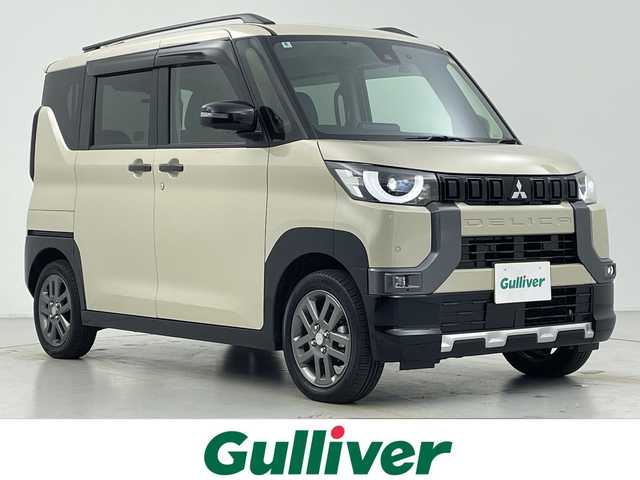 三菱 デリカミニ T プレミアム 愛知県 2024(令6)年 0.5万km ベージュⅡ 純正９インチディスプレイオーディオ/・Ｂｌｕｅｔｏｏｔｈ/・AppleCarPlay/・AndroidAuto/・AM/FM/アラウンドビューモニター/デジタルインナーミラー/両側パワースライドドア/前席シートヒーター/前後ドラレコ/ＥＴＣ/衝突軽減/レーンキープアシスト/コーナーセンサー/オートハイビーム/レーダークルコン/ステアリングヒーター/LEDヘッドライト/フォグランプ/純正ゴムマット/パドルシフト