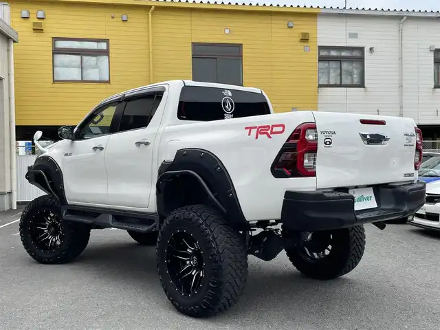 トヨタ ハイラックス Z 和歌山県 2018(平30)年 6.9万km スーパーホワイトⅡ JAOS BATTLESリフトアップキット/BTVメンバーダウンキット/ＧＩＧＥＡＲフロントバンパー/社外サイドステップ/社外SDナビ/CD/DVD/BT/フルセグTV/ETC/バックカメラ/クルコン/レーンキープアシスト/衝突軽減システム/横滑り防止装置/盗難防止装置/社外エアロ(FSR)/LEDヘッドライト/オートライト/ダウンヒルアシストコントロール/エンジンスタートボタン/スマートキー/純正フロアマット/社外アルミホイール