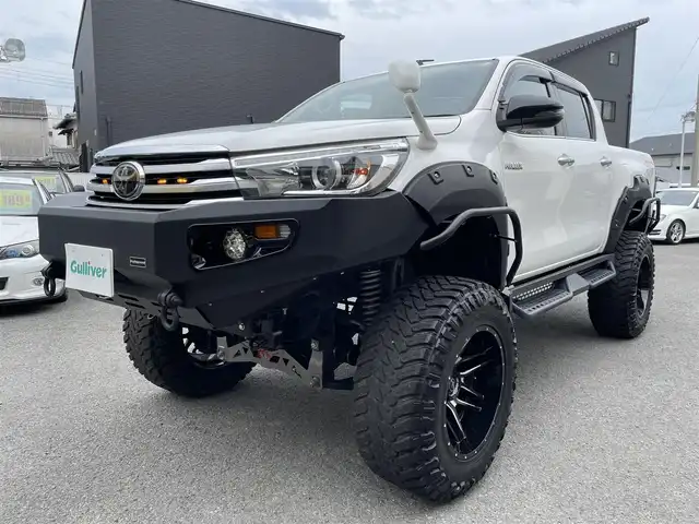 トヨタ ハイラックス Z 和歌山県 2018(平30)年 6.9万km スーパーホワイトⅡ JAOS BATTLESリフトアップキット/BTVメンバーダウンキット/ＧＩＧＥＡＲフロントバンパー/社外サイドステップ/社外SDナビ/CD/DVD/BT/フルセグTV/ETC/バックカメラ/クルコン/レーンキープアシスト/衝突軽減システム/横滑り防止装置/盗難防止装置/社外エアロ(FSR)/LEDヘッドライト/オートライト/ダウンヒルアシストコントロール/エンジンスタートボタン/スマートキー/純正フロアマット/社外アルミホイール