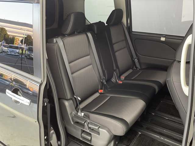 日産 セレナ ハイウェイスター 茨城県 2017(平29)年 7.7万km ダイヤモンドブラック 衝突軽減ブレーキ/純正9インチナビ/パーキングアシスト/両側パワースライドドア/クルーズコントロール　/前席シートヒーター/アイドリングストップ/横滑り防止装置/車線逸脱警報/純正フロアマット/純正ドアバイザー/スペアキー1本