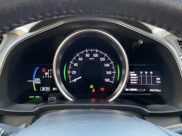 ホンダ フィット ハイブリット L ホンダセンシング 山口県 2019(令1)年 4.7万km プラチナホワイトパール 純正メモリナビ/Bluetooth/フルセグテレビ/バックカメラ/ホンダセンシング/クルーズコントロール/レーンキープアシスト/ドライブレコーダー/ETC/純正フロアマット