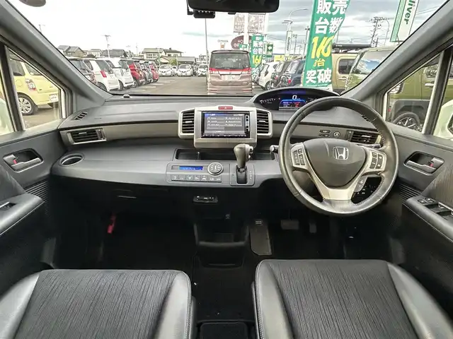 ホンダ フリード スパイク ハイブリット ジャストセレクション 宮城県 2015(平27)年 8.4万km ホワイトオーキッドパール ワンオーナー/純正SDナビ/【CD・DVD・SD・BT・フルセグTV】/バックカメラ/両側パワースライドドア/クルーズコントロール/純正エアロ/純正15インチAW/社外ドライブレコーダー/ハーフレザーシート/電動格納ミラー/ウィンカーミラー/オートライト/HIDヘッドライト/横滑り防止装置/ステアリングスイッチ/スマートキー/ETC