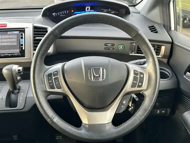 ホンダ フリード スパイク ハイブリット ジャストセレクション 宮城県 2015(平27)年 8.4万km ホワイトオーキッドパール ワンオーナー/純正SDナビ/【CD・DVD・SD・BT・フルセグTV】/バックカメラ/両側パワースライドドア/クルーズコントロール/純正エアロ/純正15インチAW/社外ドライブレコーダー/ハーフレザーシート/電動格納ミラー/ウィンカーミラー/オートライト/HIDヘッドライト/横滑り防止装置/ステアリングスイッチ/スマートキー/ETC