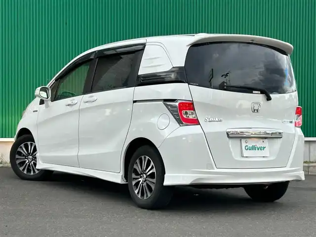 ホンダ フリード スパイク ハイブリット ジャストセレクション 宮城県 2015(平27)年 8.4万km ホワイトオーキッドパール ワンオーナー/純正SDナビ/【CD・DVD・SD・BT・フルセグTV】/バックカメラ/両側パワースライドドア/クルーズコントロール/純正エアロ/純正15インチAW/社外ドライブレコーダー/ハーフレザーシート/電動格納ミラー/ウィンカーミラー/オートライト/HIDヘッドライト/横滑り防止装置/ステアリングスイッチ/スマートキー/ETC