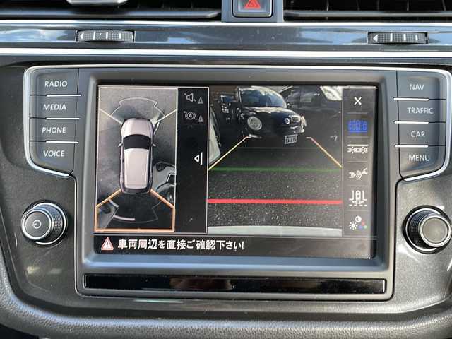 フォルクスワーゲン ティグアン TSI ハイライン 大阪府 2020(令2)年 9.5万km ピュアホワイト 純正メモリナビ/・DVD/CD/FM/AM/Bluetooth/ETC/ドライブレコーダー/バックカメラ/全周囲カメラ/レーンキープアシスト/クルーズコントロール/盗難防止装置/ステアリングリモコン/シートヒーター（D席+N席）/ルーフレール/コーナーセンサー/LEDヘッドライト/オートライト/オートエアコン/広角ミラー/電動パーキングブレーキ/スマートキー×2/プッシュスタート/12V電源/USBジャック/純正18インチアルミホイール/純正フロアマット/取扱説明書/保証書