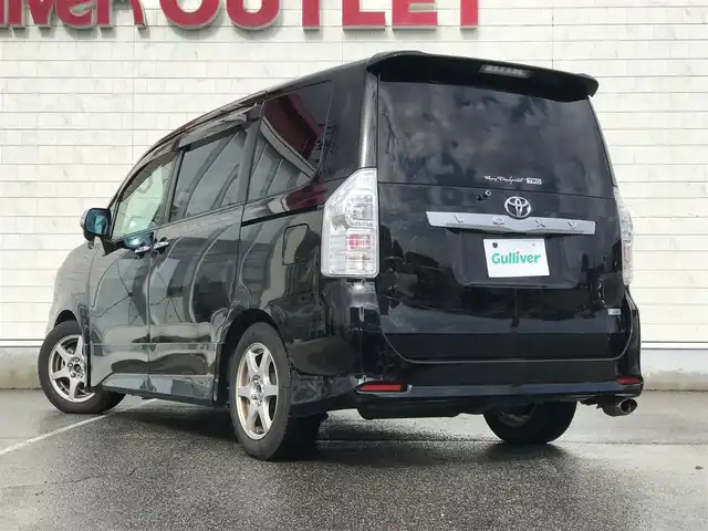 トヨタ ヴォクシー ZS 煌 富山県 2011(平23)年 8.7万km ブラック ローダウン/フリップダウンモニター/純正ナビ/フルセグTV/Bluetooth/バックカメラ/両側パワースライドドア/スマートキー/プッシュスタート/スペアキー１本/黒革調シートカバー/LEDヘッドライト/オートライト/ETC