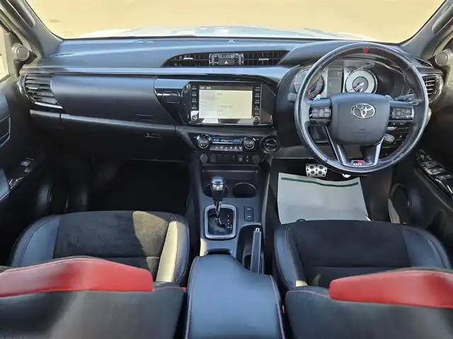 トヨタ ハイラックス Z GRスポーツ 鹿児島県 2023(令5)年 4.3万km スーパーホワイトⅡ レーダークルーズコントロール　/ＥＴＣ　/アラウンドビューモニター　/ＧＲ専用ハーフレザーシート　/前後コーナーセンサー　/純正ディスプレイオーディオ　/Ｂｌｕｅｔｏｏｔｈオーディオ　/Ｄ席パワーシート/横滑り防止機能/レーンキープアシスト/プッシュスタート/スマートキー/純正アルミホイール(18インチ)