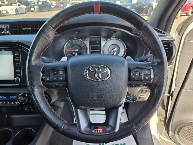 トヨタ ハイラックス Z GRスポーツ 鹿児島県 2023(令5)年 4.3万km スーパーホワイトⅡ レーダークルーズコントロール　/ＥＴＣ　/アラウンドビューモニター　/ＧＲ専用ハーフレザーシート　/前後コーナーセンサー　/純正ディスプレイオーディオ　/Ｂｌｕｅｔｏｏｔｈオーディオ　/Ｄ席パワーシート/横滑り防止機能/レーンキープアシスト/プッシュスタート/スマートキー/純正アルミホイール(18インチ)