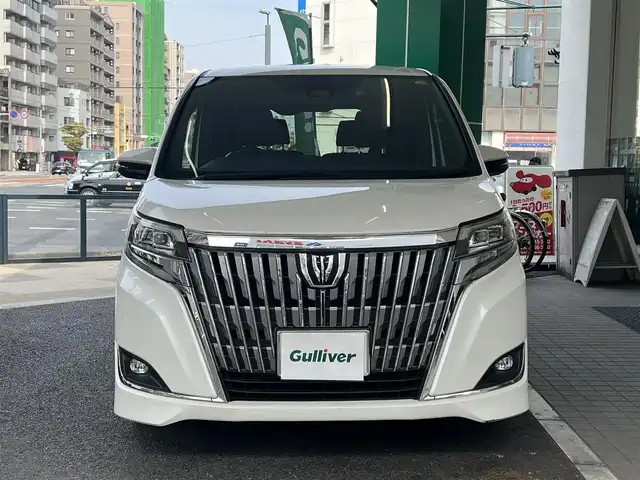 トヨタ エスクァイア Gi 広島県 2018(平30)年 10.9万km ホワイトパールクリスタルシャイン ワンオーナー/純正ディーラーオプション9インチSDナビ/・フルセグTV/・Bluetooth/・DVD/フリップダウンモニター/セーフティーセンス/・衝突回避支援パッケージ/・先行車発進告知機能/オートライト/オートマチックハイビーム/ビルトインETC/フロントシートヒーター/ドラレコ/両側パワースライドドア