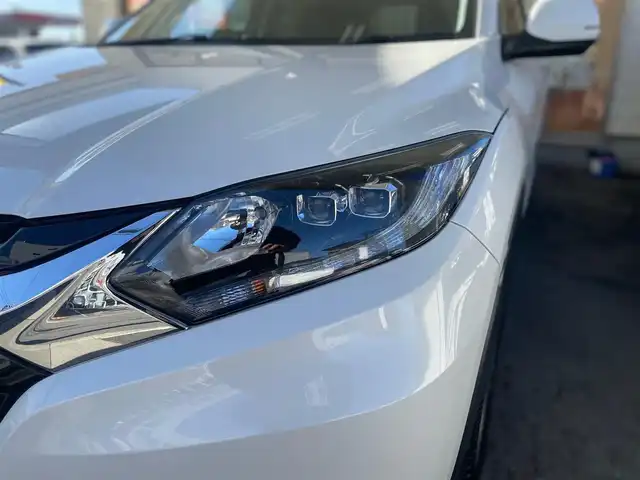 ホンダ ヴェゼル S 愛知県 2015(平27)年 5万km ホワイトオーキッドパール /当店買取/禁煙/1オーナー//純正ナビVXM-152VFi//フルセグTV/CD/DVD/SD/USB/Bluetooth//CTBA/LEDヘッド/Aライト//パドルシフト//あんしんパッケージ/ナビ装着SPパッケージ/コンフォートビューパッケージ//スタイリッシュパッケージ//ハーフレザー/シートヒーター//ISOFIX/純正Fマット//Aストップ/革巻きステアリング/クルコン//ブレーキホールド//保証書/取説/スペアキー