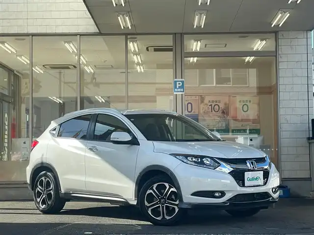 ホンダ ヴェゼル S 愛知県 2015(平27)年 5万km ホワイトオーキッドパール /当店買取/禁煙/1オーナー//純正ナビVXM-152VFi//フルセグTV/CD/DVD/SD/USB/Bluetooth//CTBA/LEDヘッド/Aライト//パドルシフト//あんしんパッケージ/ナビ装着SPパッケージ/コンフォートビューパッケージ//スタイリッシュパッケージ//ハーフレザー/シートヒーター//ISOFIX/純正Fマット//Aストップ/革巻きステアリング/クルコン//ブレーキホールド//保証書/取説/スペアキー