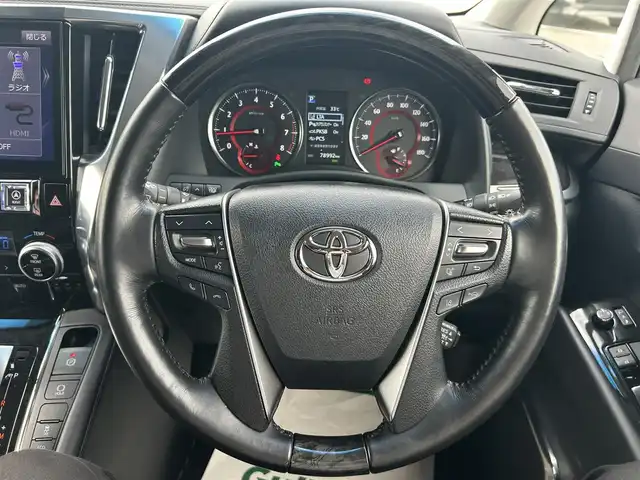 トヨタ アルファード S Cパッケージ 岡山県 2020(令2)年 7.9万km ホワイトパールクリスタルシャイン ALPINE10インチナビ/フルセグTV(AM.FM.CD.DVD.TV.BT)/バックカメラ/ALPINE12.8インチフリップダウンモニター/ビルトインETC/前後ドライブレコーダー/両側パワースライドドア/前席シートヒーター/前席ベンチレーション/D席メモリーシート/前席パワーシート/パワーバックドア/デジタルインナーミラー/ブラインドスポットモニター/レーダークルーズコントロール/トヨタセーフティセンス/・レーントレーシングアシスト/・パーキングサポートブレーキ/・プリクラッシュセーフティ/・インテリジェントクリアランスソナー/・ロードサインアシスト/・オートマチックハイビーム/ロールサンシェード/AC100V