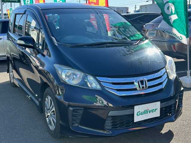 ホンダ フリード Gエアロ 宮城県 2012(平24)年 14.1万km プレミアムブラキッシュパール 社外ナビ/（型番：CN-H500D）/・フルセグTV/CD/DVD/Bluetooth/ipad/デジタルインナーミラー/・バックカメラ/前後ドライブレコーダー/社外ETC/2.3列目シートカバー/・ウォークスルー/横滑り防止装置/アイドリングストップ/エンジンスターター/オートライト/純正アルミホイール/純正フロアマット/スタッドレスタイヤ積み込み