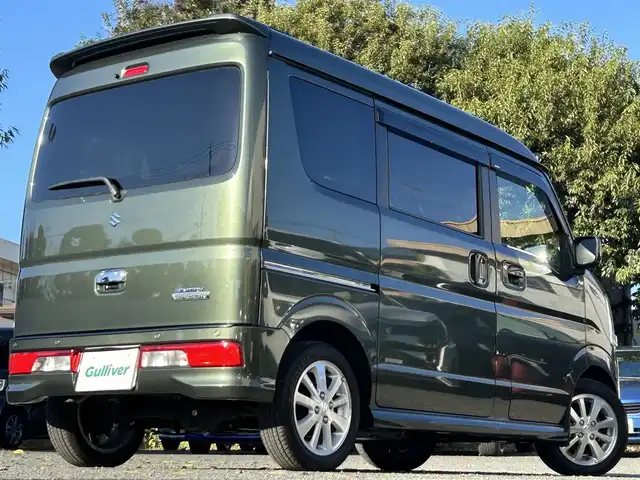 スズキ エブリィ ワゴン PZターボ 東京都 2023(令5)年 1.3万km クールカーキPM ワンオーナー/パワースライドドア/ディスプレイオーディオ/・Bluetoothオーディオ/USBオーディオ/・バックカメラ/キーレスプッシュスタートシステム/HIDヘッドランプ/オートライト/シートヒーター（運転席）/ETC/取扱説明書/保証書/・ディーラー点検記録簿（R5~R7）/スペアキー1本