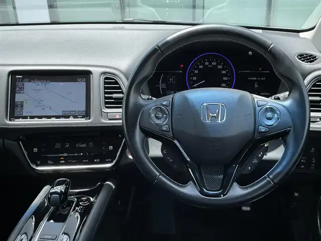 ホンダ ヴェゼル ハイブリッド Z ホンダセンシング 香川県 2019(令1)年 3.3万km プラチナホワイトパール 登録時走行距離：32590ｋｍ/純正SDナビゲーション/→CD/DVD/BT/→フルセグTV/全方位カメラ/ドライブレコーダー/革巻きステアリング/ステアリングリモコン/レーダークルーズコントロール/ビルトインETC/シートヒーター/プッシュスタート/LEDオートライト/純正アルミホイール/衝突軽減ブレーキ/横滑り防止装置/フロアマット/スマートキー
